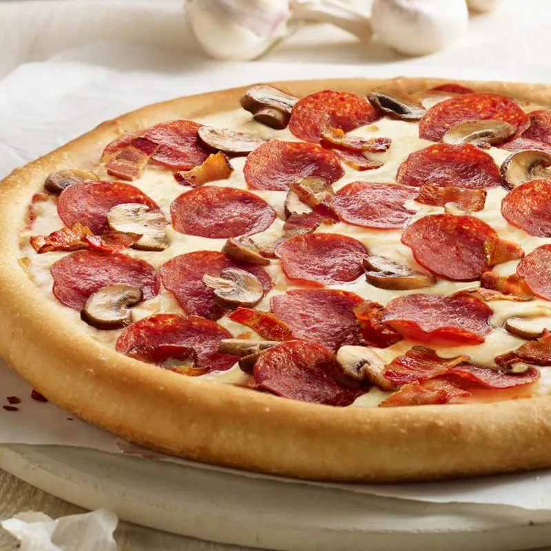 Butter Chicken Special Pizza at Supreme Pizza Edmonton